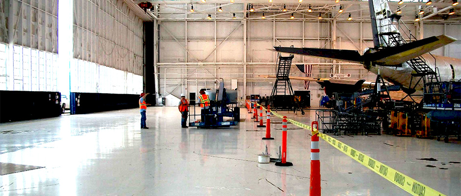 http://www.assetgroup.com/wp-content/uploads/2013/04/Replace-Hangar-Doors-Building-240_4.jpg